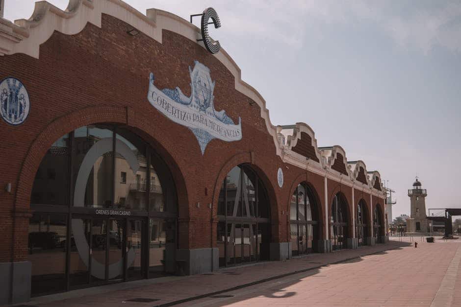 Facade of the Orenes Gran Casino in Castellón de la Plana, featuring classic architecture under a clear sky.