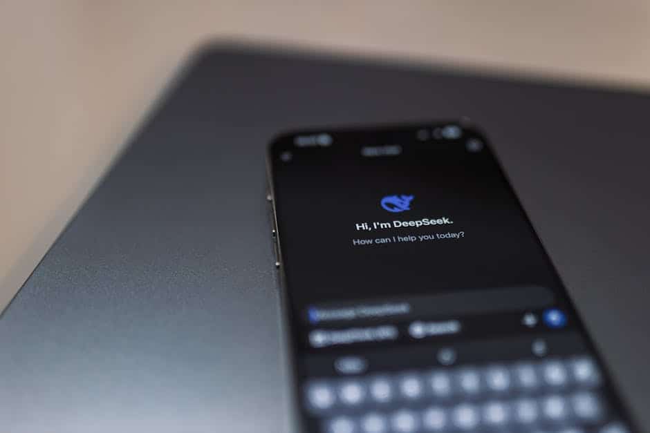 Close-up of a smartphone displaying an AI chat interface with the DeepSeek app.